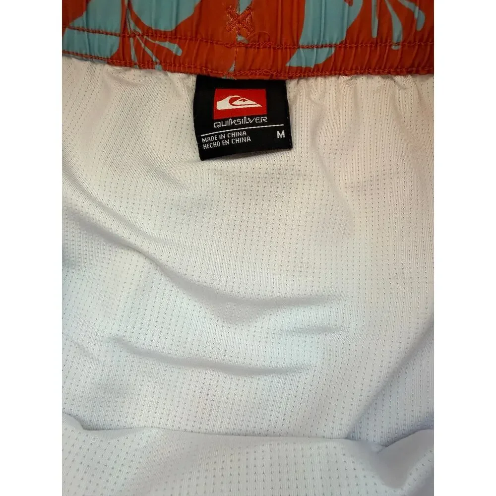 Quiksilver waterman boardshorts blue orange floral size med